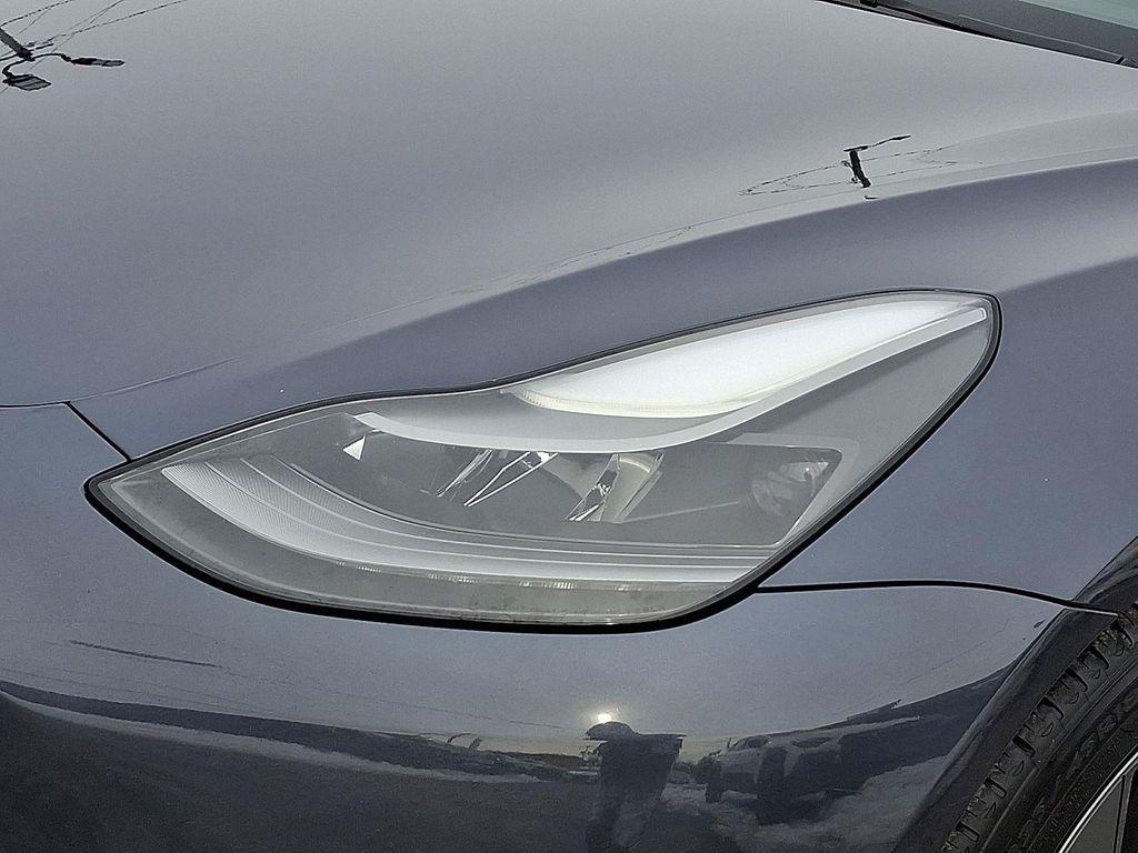 used 2023 Tesla Model 3 car, priced at $23,500