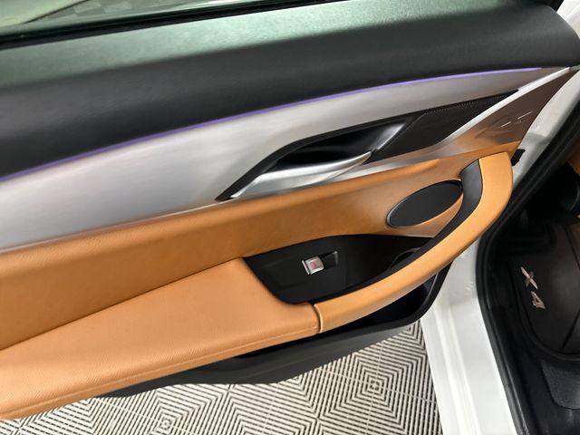 used 2023 BMW X4 car, priced at $40,290