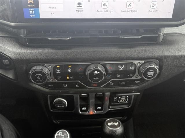 used 2024 Jeep Wrangler car, priced at $32,000