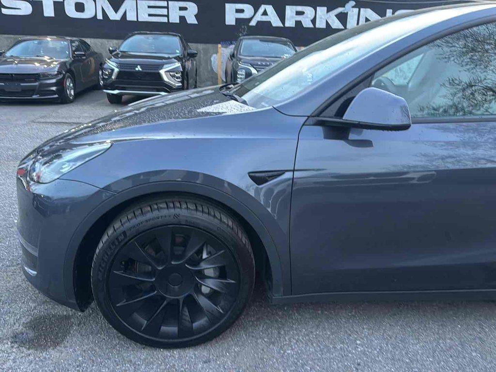 used 2023 Tesla Model Y car, priced at $25,815