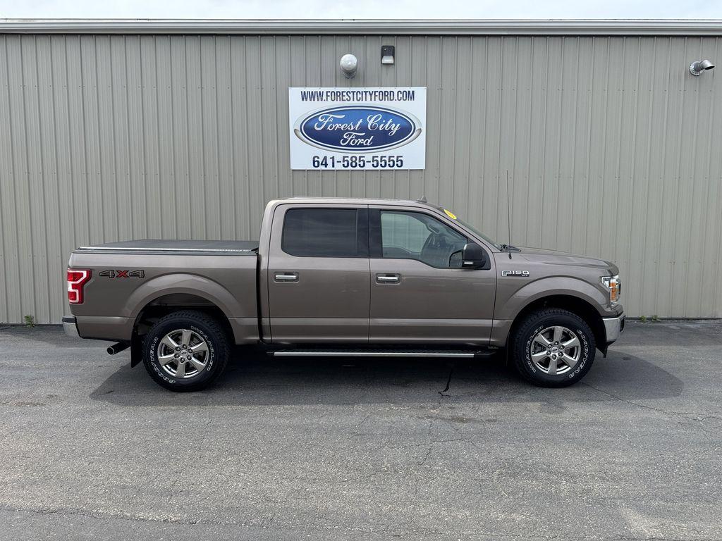 used 2018 Ford F-150 car, priced at $23,068