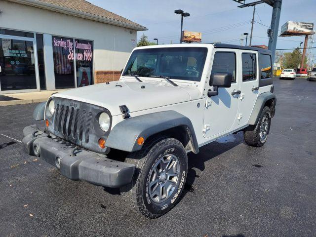 used 2013 Jeep Wrangler Unlimited car, priced at $13,490