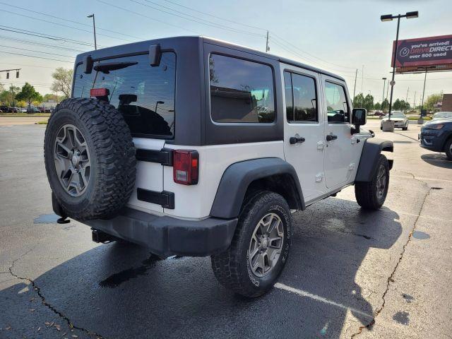 used 2013 Jeep Wrangler Unlimited car, priced at $13,490