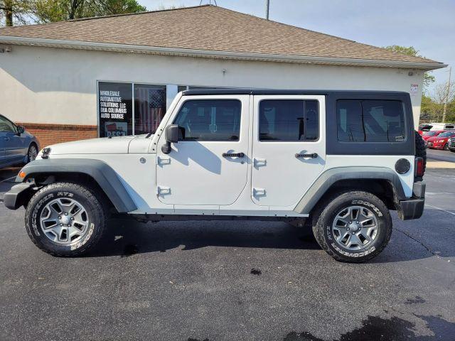used 2013 Jeep Wrangler Unlimited car, priced at $13,490