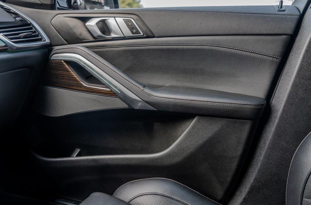 used 2023 BMW X6 car, priced at $55,795