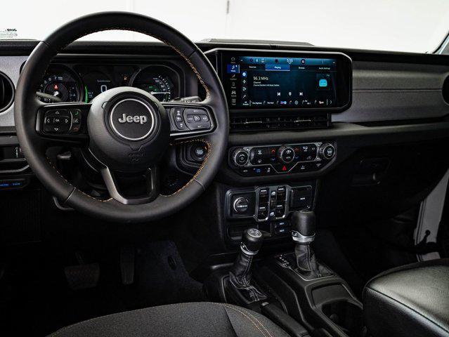 used 2024 Jeep Wrangler 4xe car, priced at $31,998