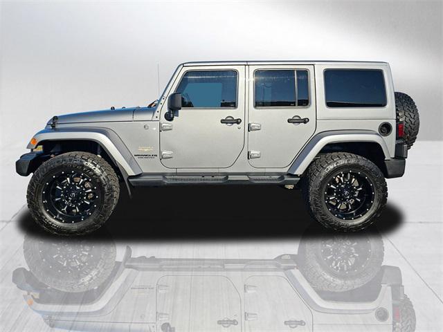 used 2014 Jeep Wrangler Unlimited car, priced at $18,581