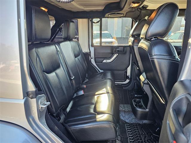 used 2014 Jeep Wrangler Unlimited car, priced at $18,581