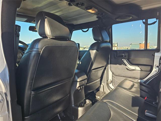 used 2014 Jeep Wrangler Unlimited car, priced at $18,581