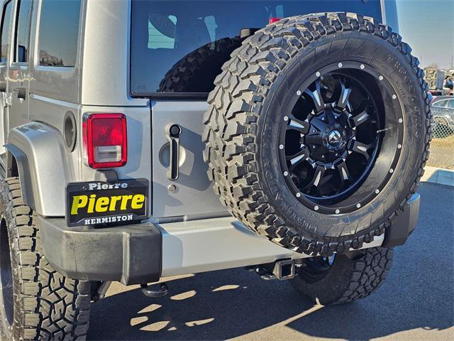 used 2014 Jeep Wrangler Unlimited car, priced at $18,581