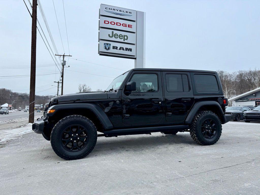 used 2023 Jeep Wrangler car, priced at $29,974