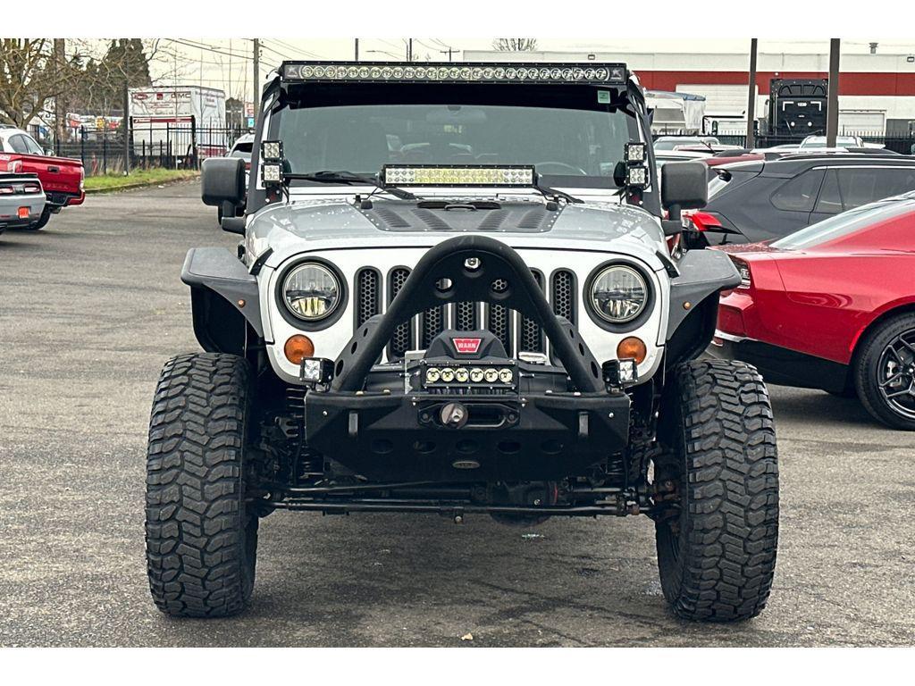 used 2011 Jeep Wrangler Unlimited car, priced at $15,999