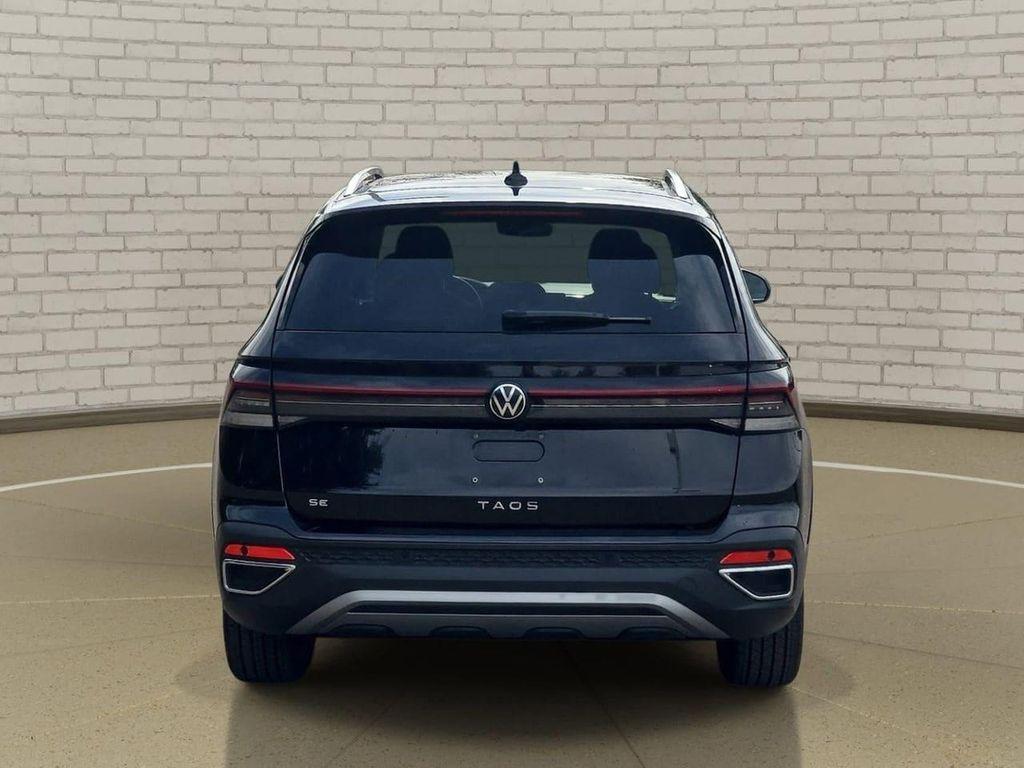 used 2025 Volkswagen Taos car, priced at $23,878