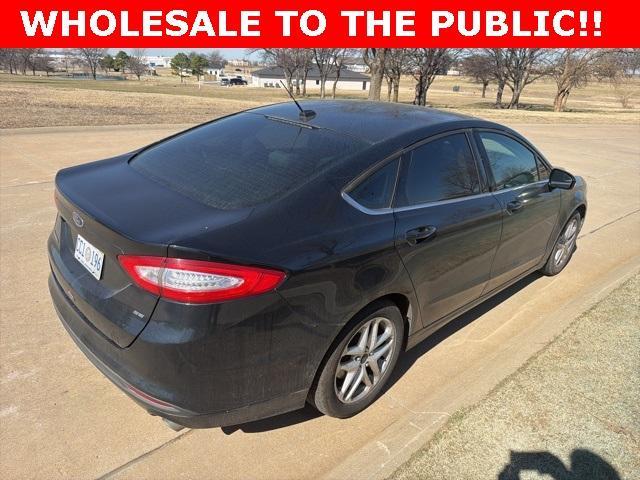 used 2014 Ford Fusion car, priced at $6,000