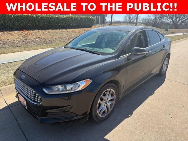 used 2014 Ford Fusion car, priced at $6,000