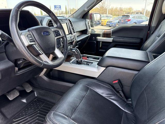 used 2015 Ford F-150 car, priced at $14,000