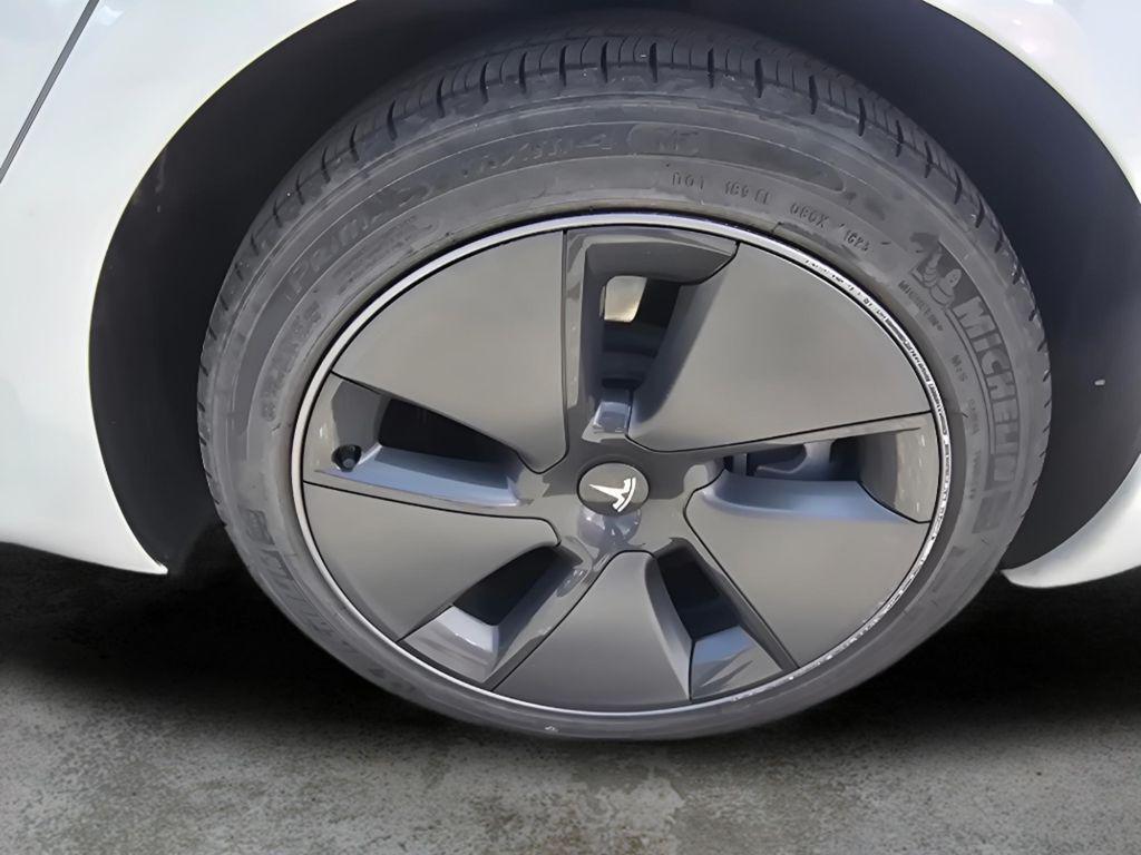 used 2023 Tesla Model 3 car, priced at $27,694