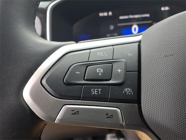 used 2025 Volkswagen Taos car, priced at $25,000