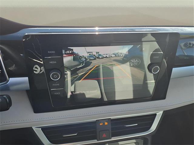 used 2025 Volkswagen Taos car, priced at $25,300