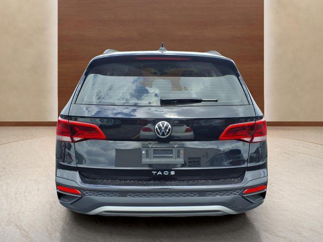 used 2023 Volkswagen Taos car, priced at $18,000