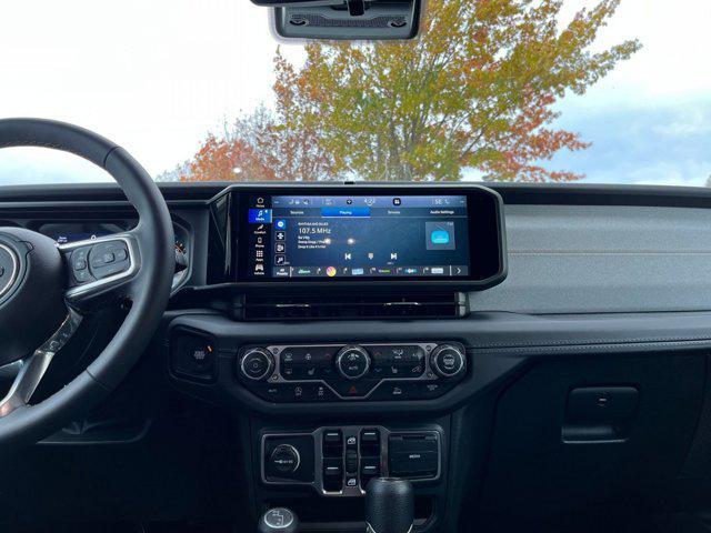 used 2025 Jeep Wrangler car, priced at $34,100