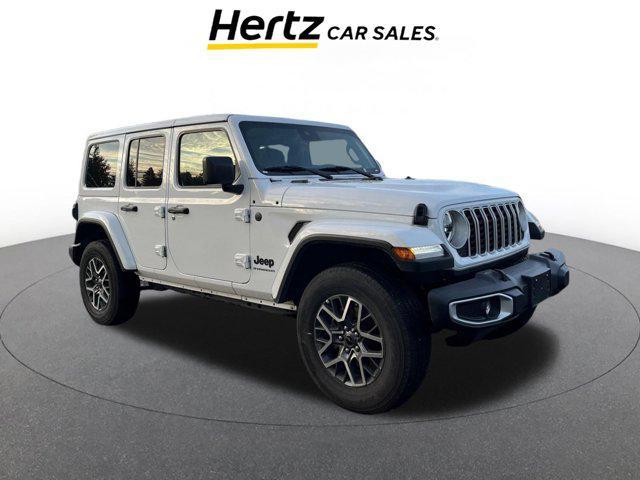 used 2025 Jeep Wrangler car, priced at $34,348