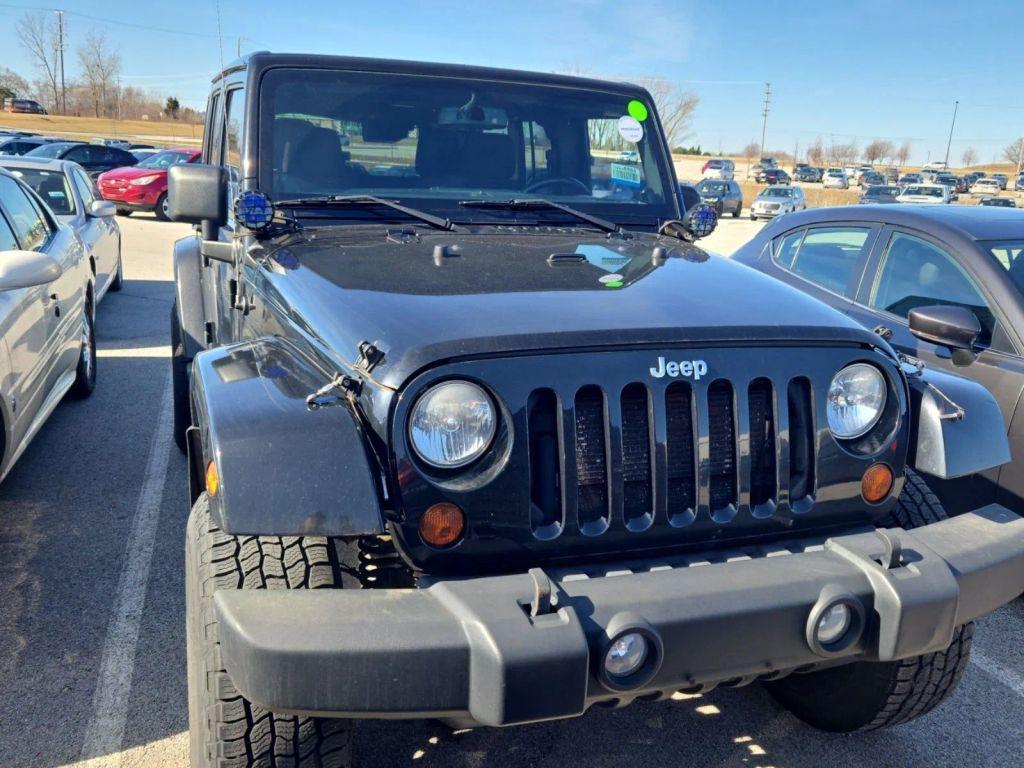 used 2013 Jeep Wrangler Unlimited car, priced at $17,999