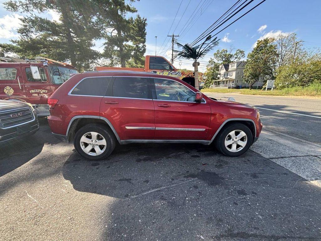 used 2011 Jeep Grand Cherokee car, priced at $2,495