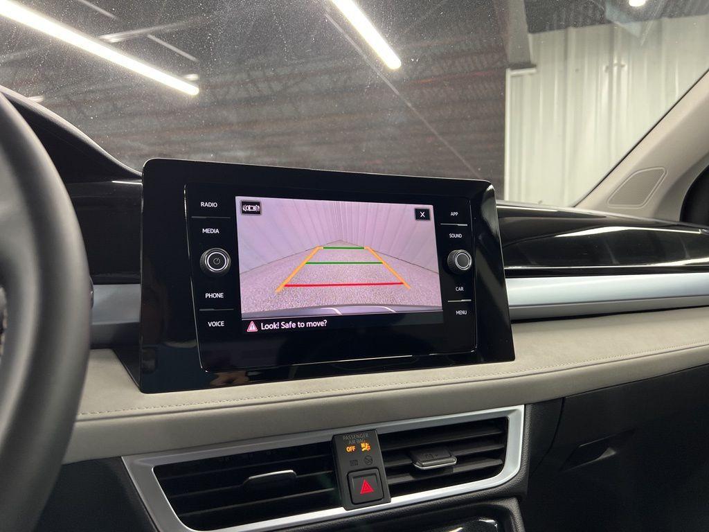 used 2025 Volkswagen Taos car, priced at $22,748