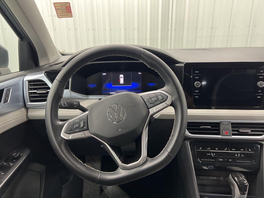 used 2025 Volkswagen Taos car, priced at $22,748