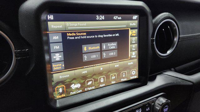 used 2023 Jeep Wrangler 4xe car, priced at $28,545