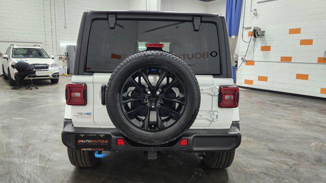 used 2023 Jeep Wrangler 4xe car, priced at $28,545