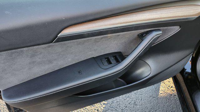 used 2023 Tesla Model 3 car, priced at $20,700