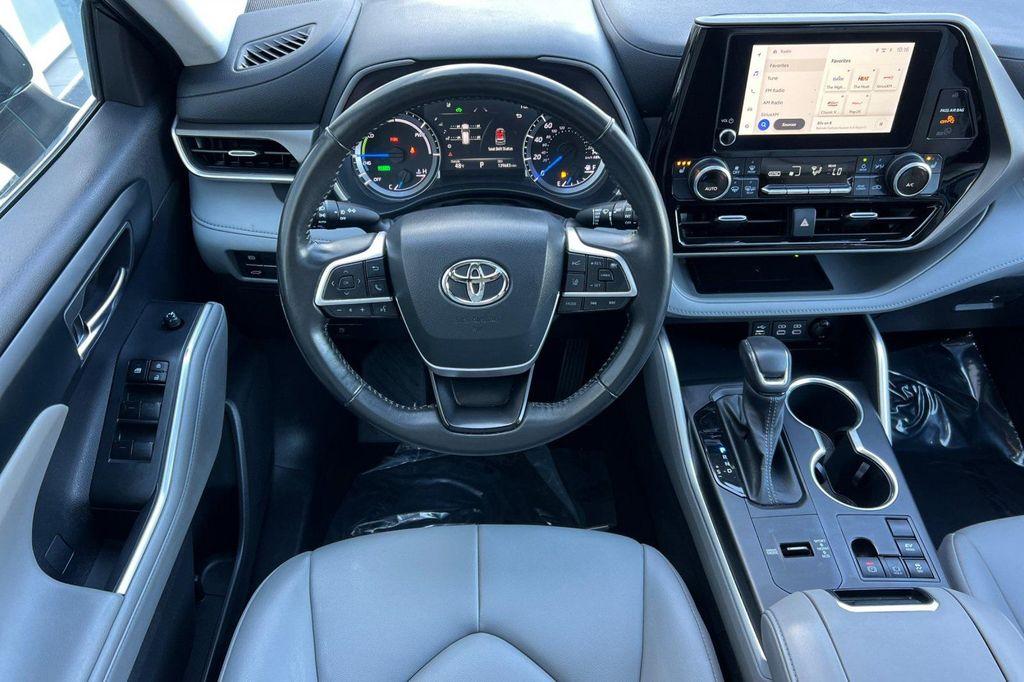 used 2023 Toyota Highlander Hybrid car, priced at $25,961