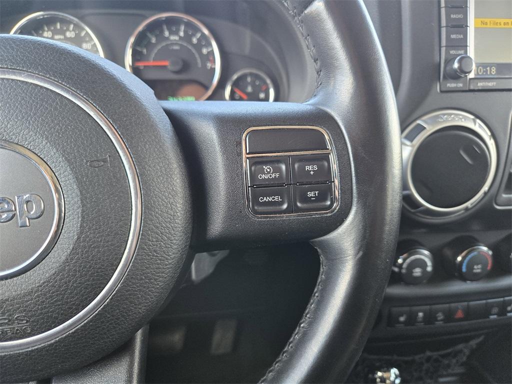 used 2012 Jeep Wrangler Unlimited car, priced at $14,342