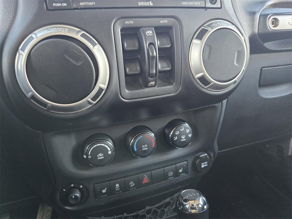 used 2012 Jeep Wrangler Unlimited car, priced at $14,342