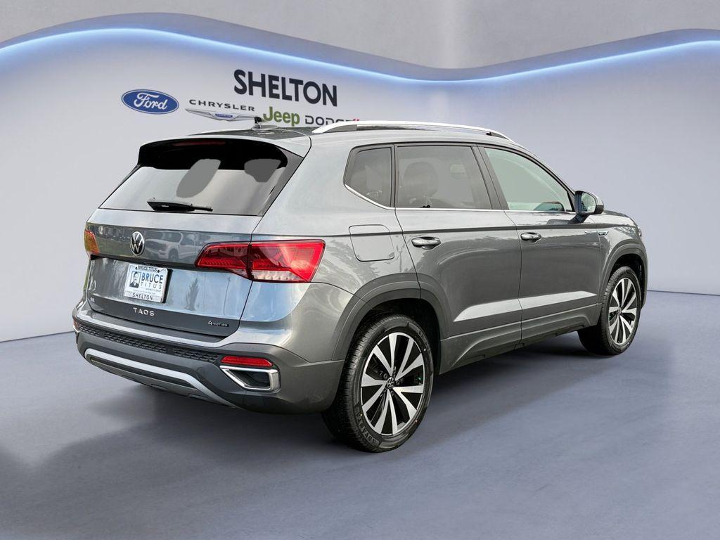 used 2022 Volkswagen Taos car, priced at $16,591