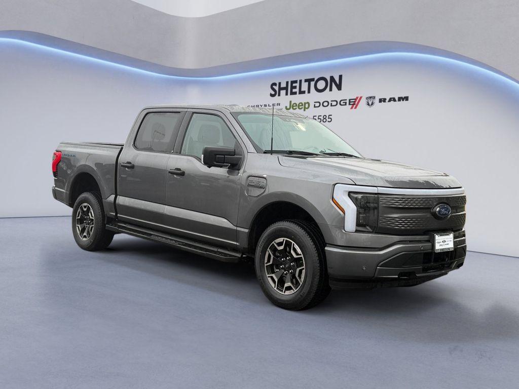used 2023 Ford F-150 Lightning car, priced at $35,491