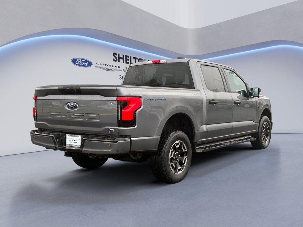 used 2023 Ford F-150 Lightning car, priced at $35,491
