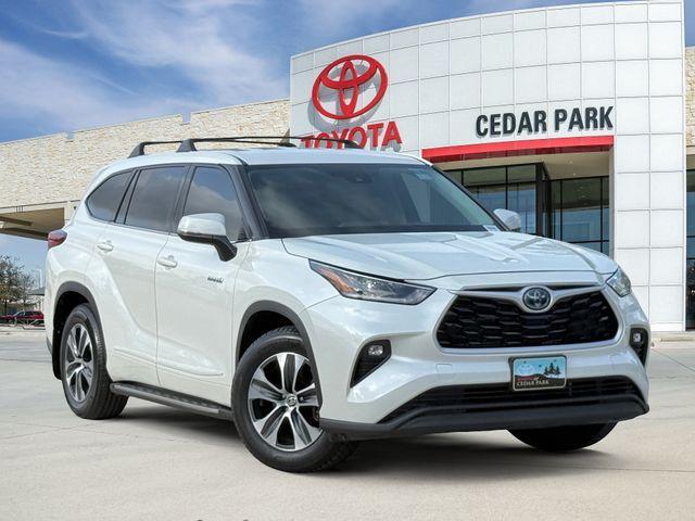 used 2021 Toyota Highlander Hybrid car, priced at $26,723