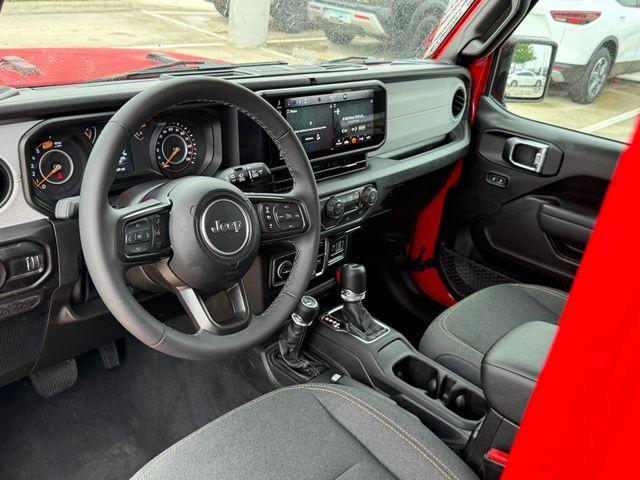 used 2025 Jeep Wrangler car, priced at $33,220