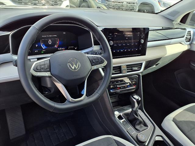 used 2025 Volkswagen Taos car, priced at $22,988
