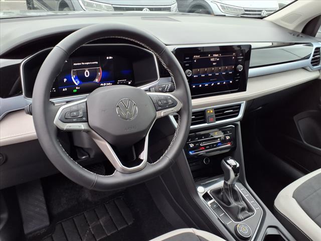used 2025 Volkswagen Taos car, priced at $22,988