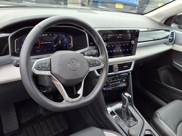 used 2025 Volkswagen Taos car, priced at $33,311