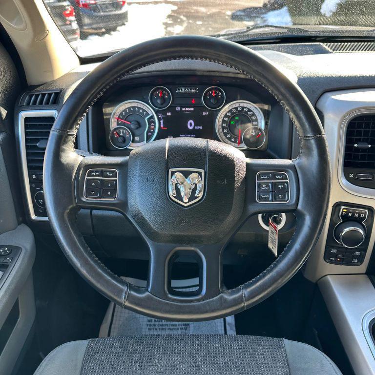 used 2015 Ram 1500 car, priced at $14,500