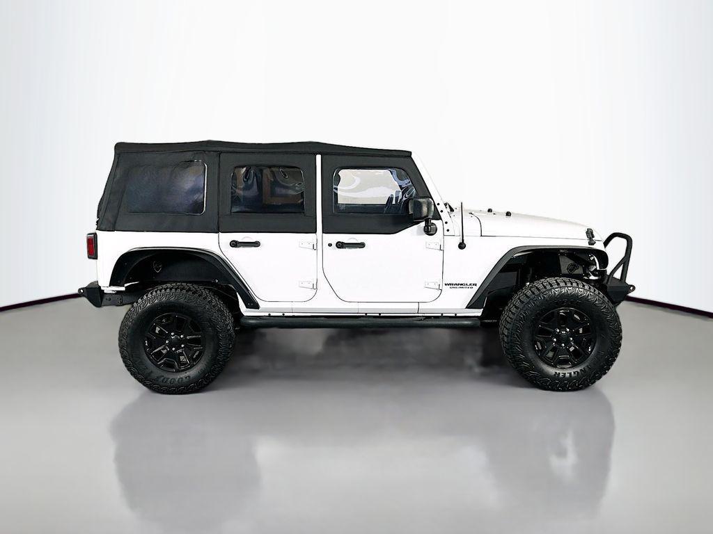 used 2016 Jeep Wrangler Unlimited car, priced at $20,184