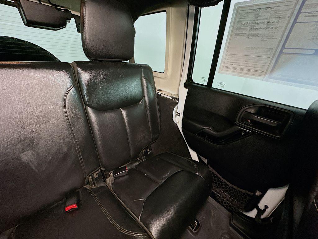 used 2014 Jeep Wrangler Unlimited car, priced at $13,584
