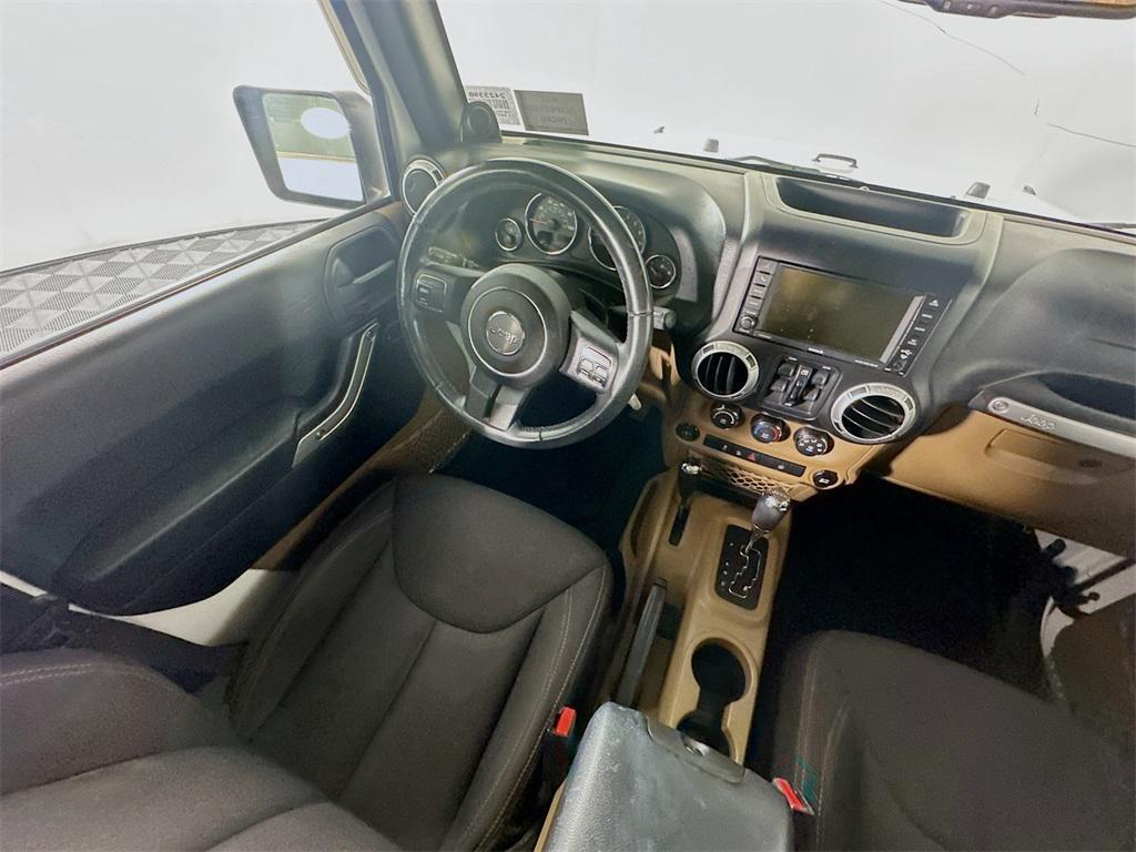 used 2013 Jeep Wrangler Unlimited car, priced at $13,785