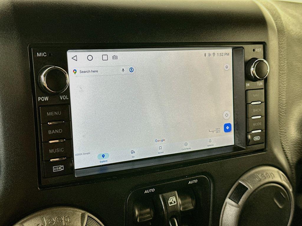 used 2015 Jeep Wrangler Unlimited car, priced at $14,284