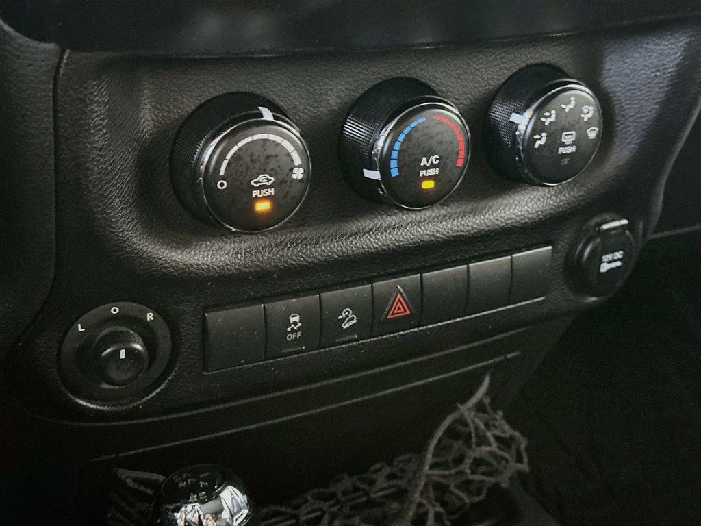 used 2015 Jeep Wrangler Unlimited car, priced at $14,284